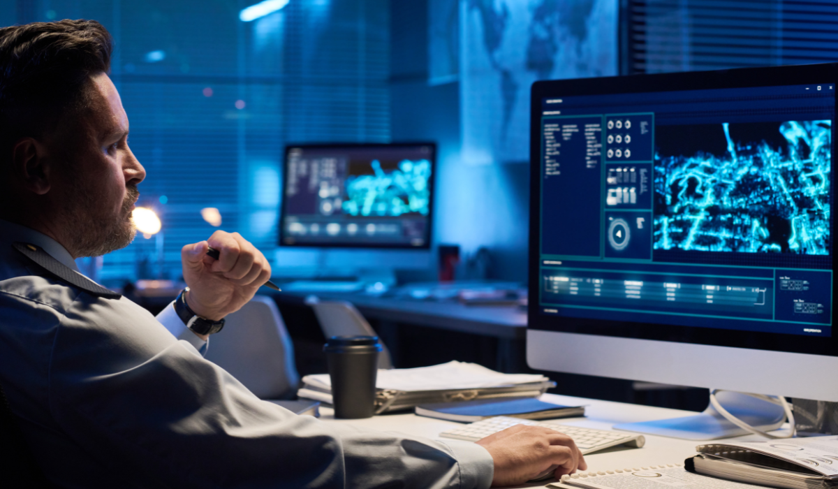 Federal security operations center analysts monitoring SIEM dashboards in 24x7 SOC